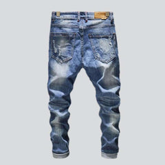 Light wash men ripped jeans
