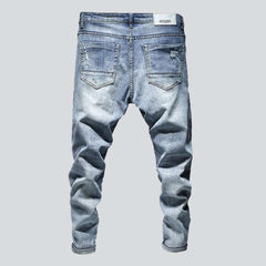 Light blue ripped men jeans