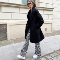 Pantalones acampanados de cintura alta con estampado animal de Priscilla