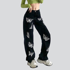 Women black jeans with butterflies