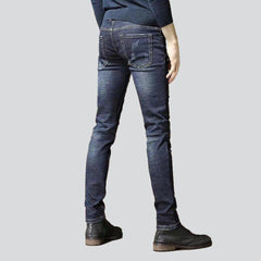 Vaqueros de hombre decorados en azul marino