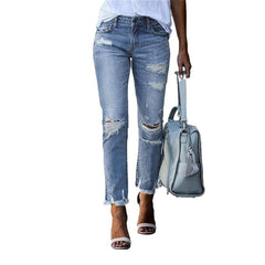 Distressed women slim jeans