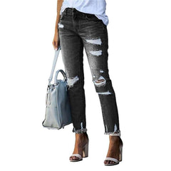 Distressed women slim jeans