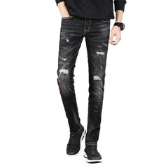 Slightly ripped black men jeans