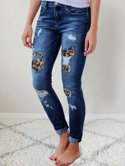 Skinny Jeans mit Rissen und Leopardenmuster