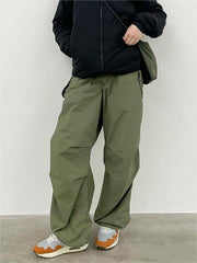 Grüne Oversize-Cargohose mit Fallschirm und Kordelzug
