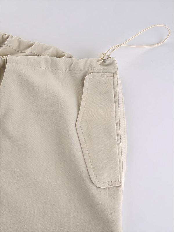 Pantalones cargo holgados de paracaídas beige con cordón ajustable