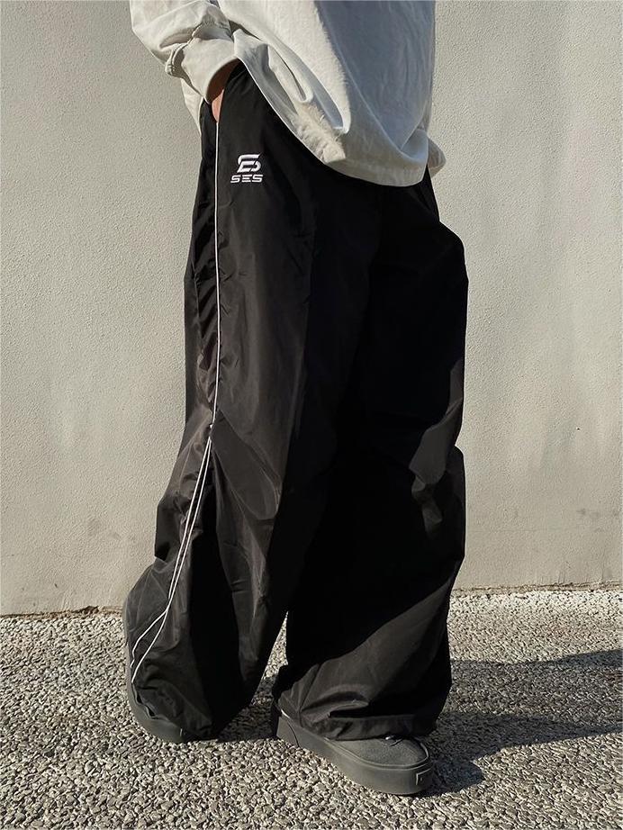 Fallschirmhose mit weitem Bein und Paspelierung im Vintage-Stil