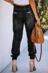 Schwarze Distressed-Jeans mit Taschen