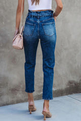 Blaue Skinny Jeans mit hoher Taille und Knoten