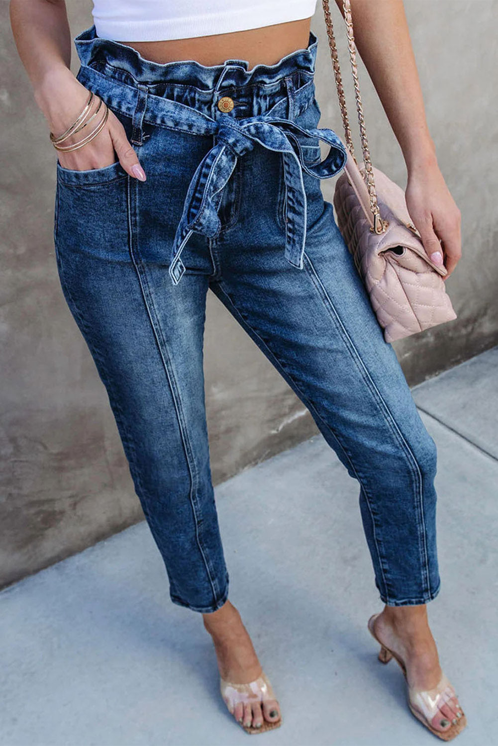 Blaue Skinny Jeans mit hoher Taille und Knoten