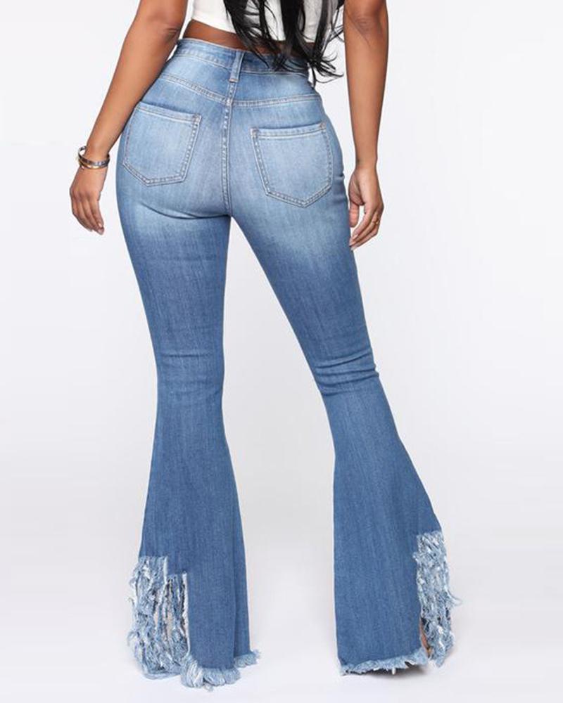 Distressed Jeans mit asymmetrischem Fransensaum, ausgestelltem Bein und hoher Taille