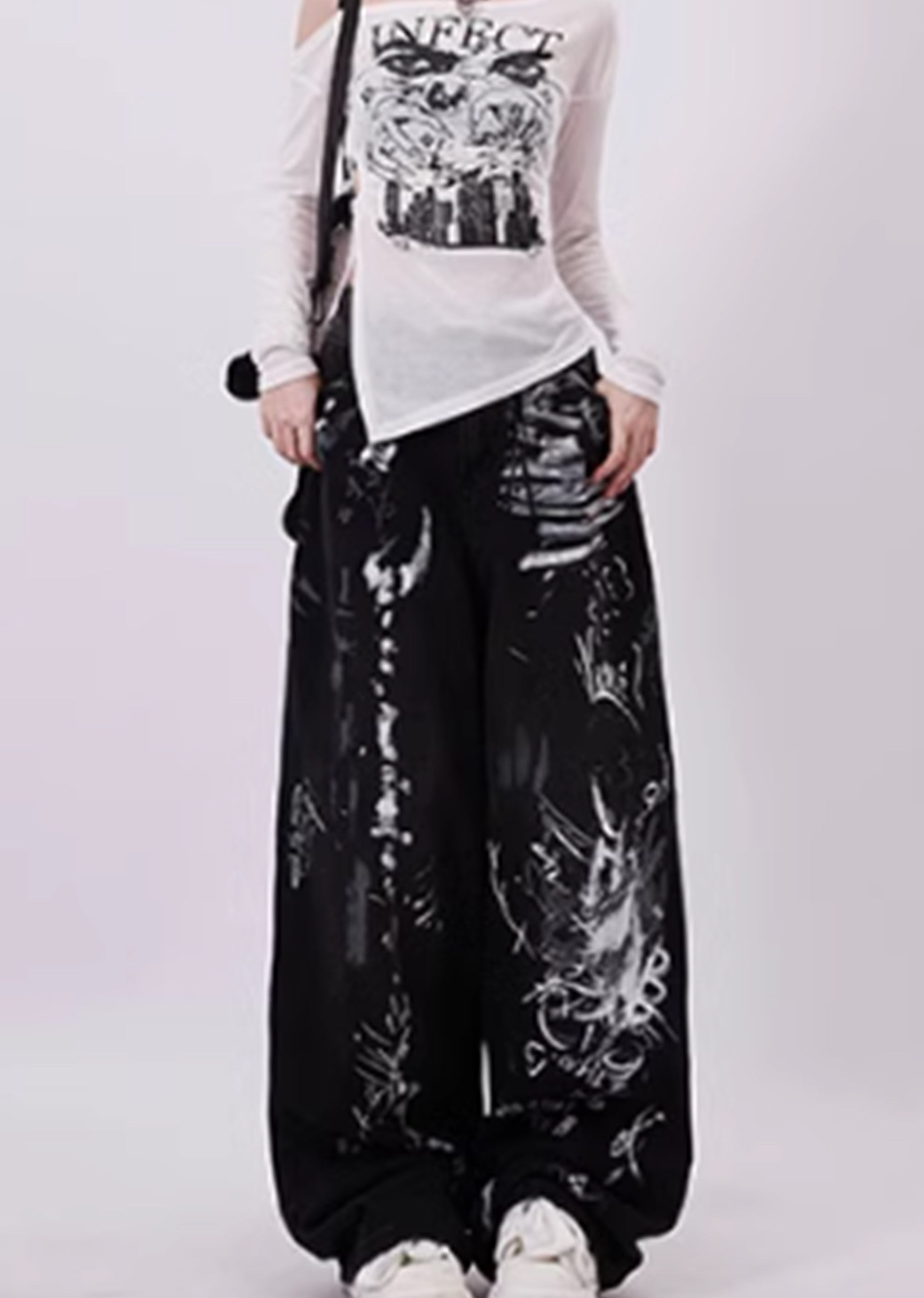 Schwarze Baggy-Jeans mit Grunge-Graffiti-Print