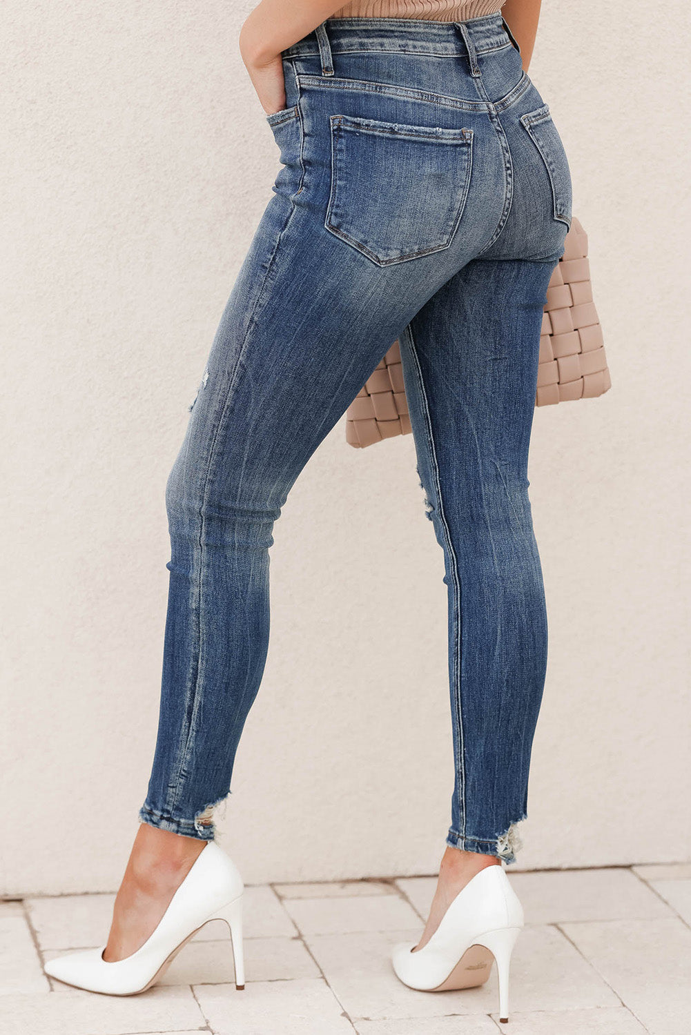 Himmelblaue, asymmetrische Skinny Jeans mit Knopfleiste und Reißverschluss