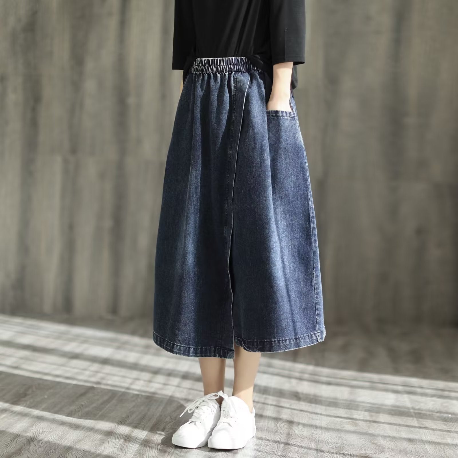 Asymmetric denim skirt with rubber