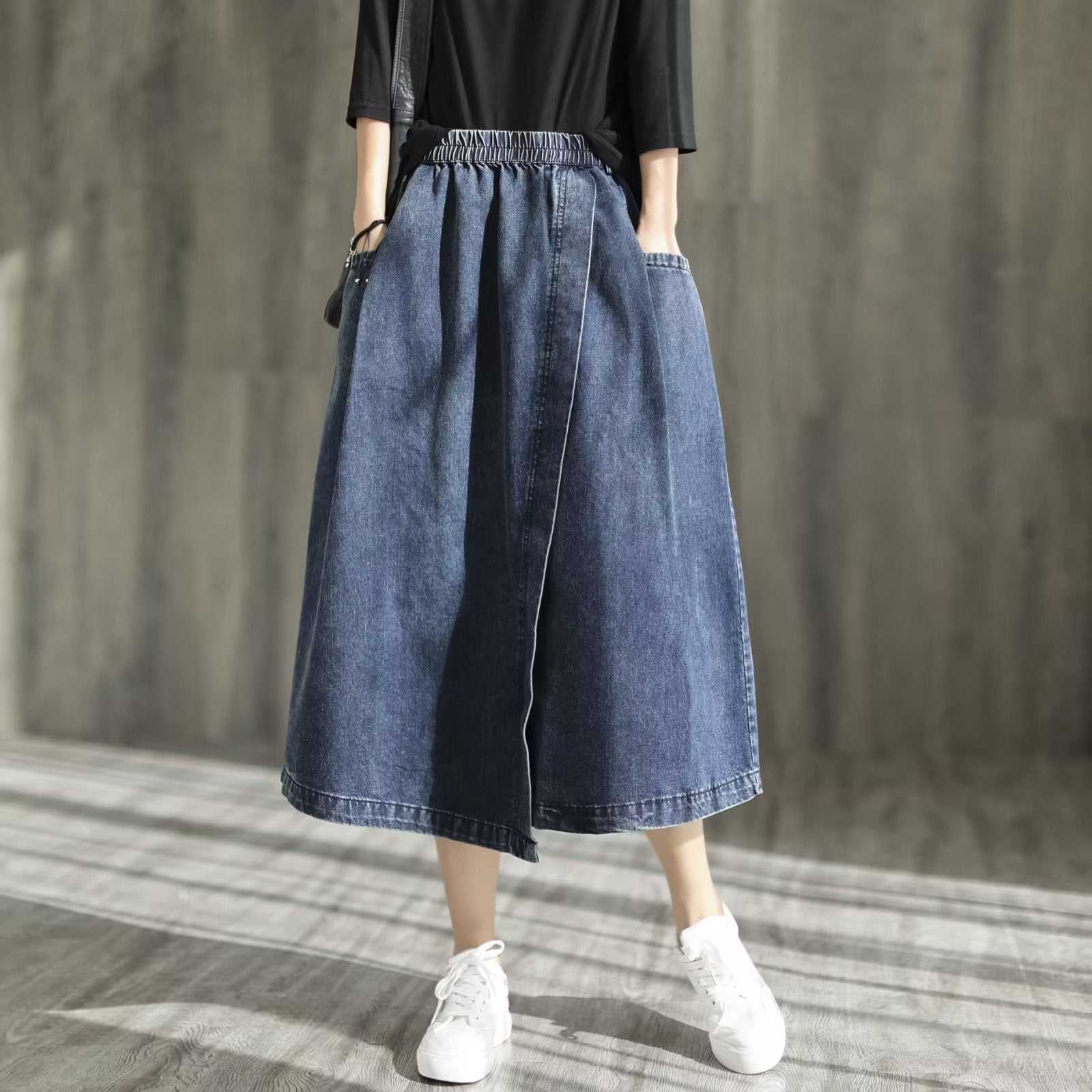 Asymmetric denim skirt with rubber