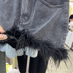 Feather-trimmed mini denim skirt