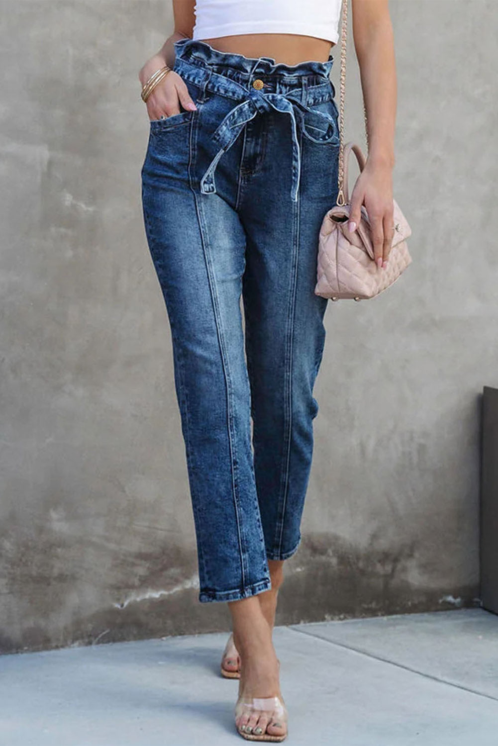 Blaue Skinny Jeans mit hoher Taille und Knoten