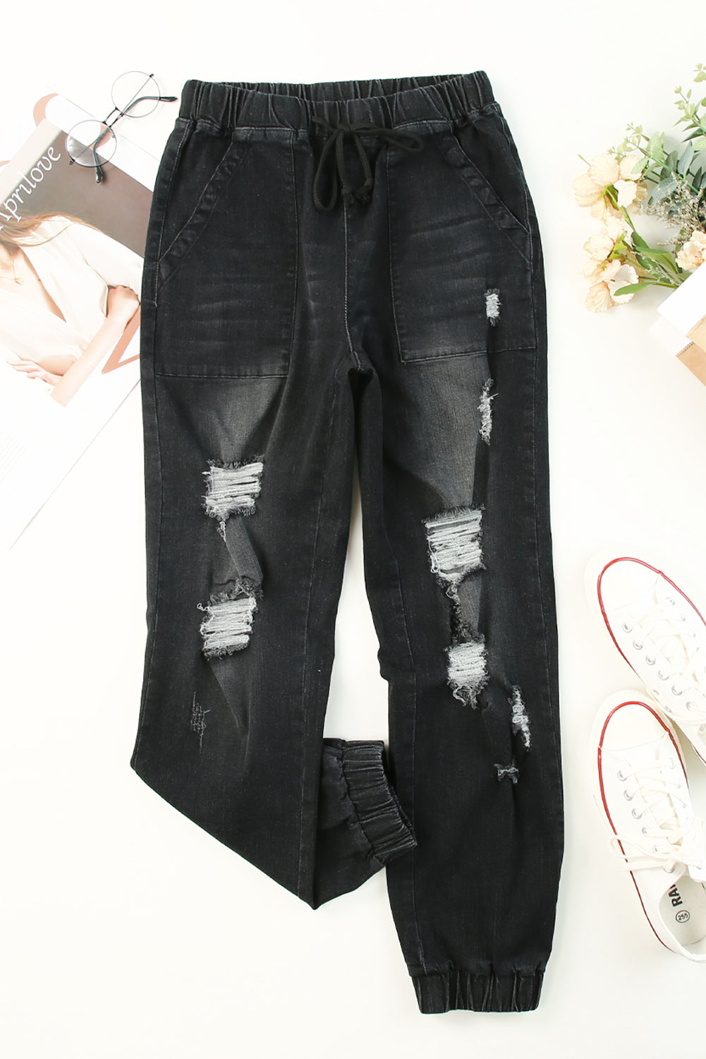 Schwarze Distressed-Jeans mit Taschen