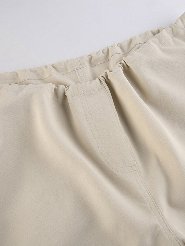 Pantalones cargo holgados de paracaídas beige con cordón ajustable