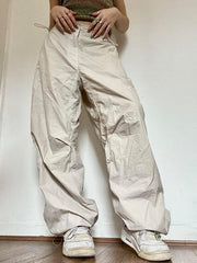 Pantalones cargo holgados de paracaídas beige con cordón ajustable