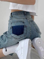 Shorts vaqueros con dobladillo sin rematar hasta la rodilla