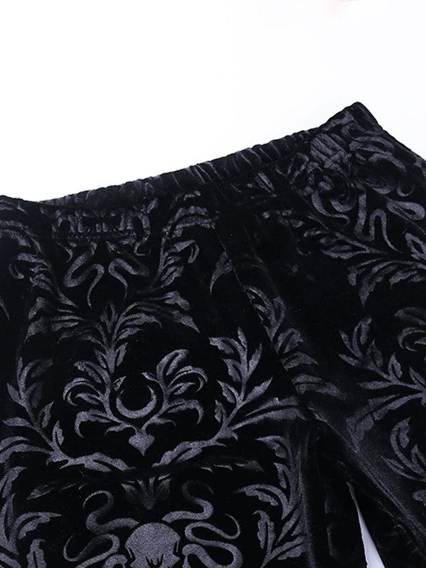 Pantalones acampanados de terciopelo negro con relieve vintage