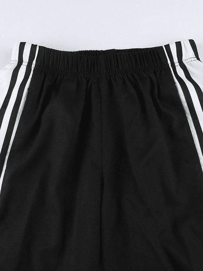 Pantalones deportivos holgados clásicos negros con raya lateral