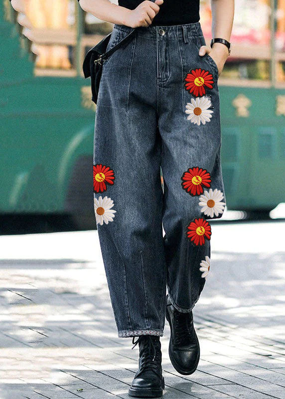 Pantalones vaqueros estilo harén de cintura alta con bolsillos y estampado floral azul marino para otoño.