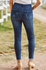 Baeful – Distressed-Jeans mit Knopfleiste und ungesäumtem Saum