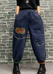 Hermosos pantalones vaqueros cortos con cintura elástica y parches bordados en azul