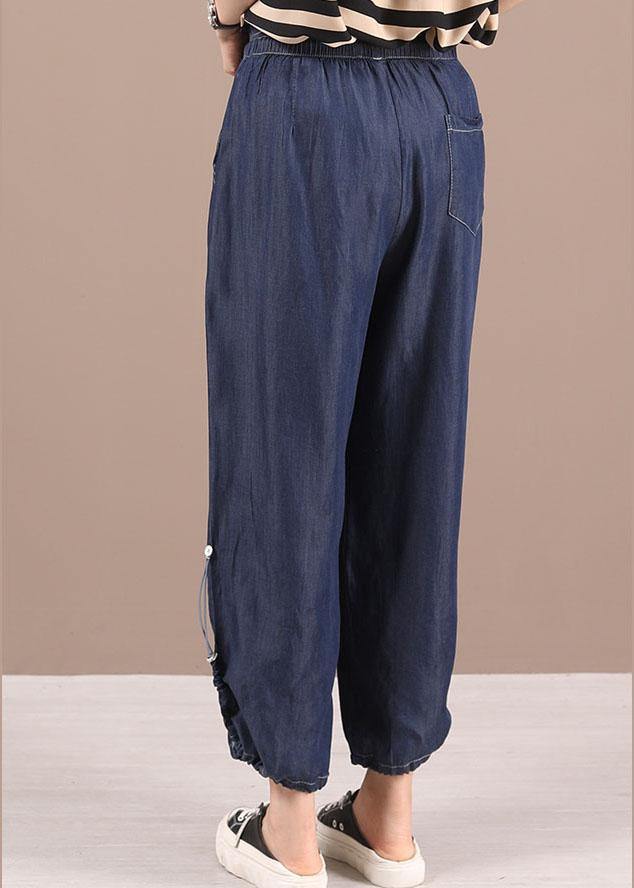 Hermosos pantalones harén de mezclilla con bolsillos azules