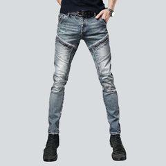 Biker jeans with diagonal pockets