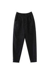 Pantalón de mezclilla de algodón negro con botones ceñidos