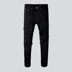 Schwarze Skinny-Bikerjeans mit Patch