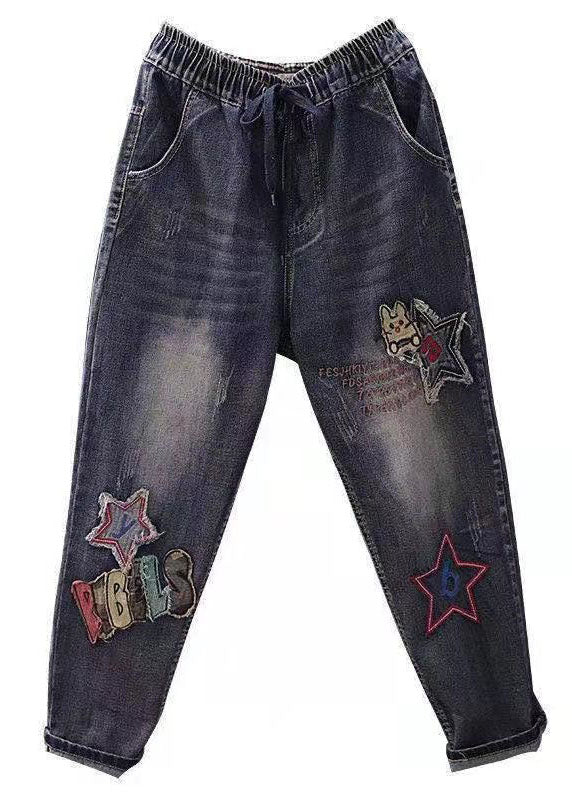 Pantalones vaqueros de cintura alta con parches y bolsillos bordados en azul bohemio