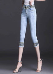 Boutique Hellblaue, hoch taillierte, schmale Crop-Hose aus Baumwoll-Denim mit Reißverschluss und Patchwork-Spitze