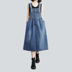 Buttoned denim dress with suspenders