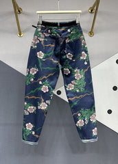 Pantalones vaqueros chic con parches florales y bolsillos en azul marino para otoño