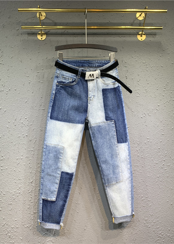 DIY Blaue Patchwork-Jeanshose mit hoher Taille und Taschen für den Herbst