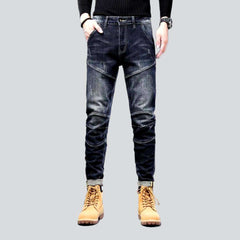 Dark wash sanded biker jeans