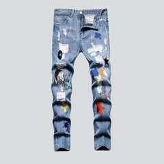 Embroidered ripped jeans for men