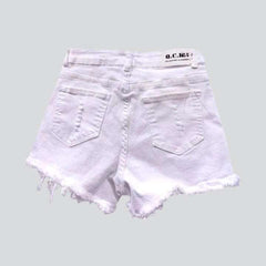 Crystal flower distressed denim shorts