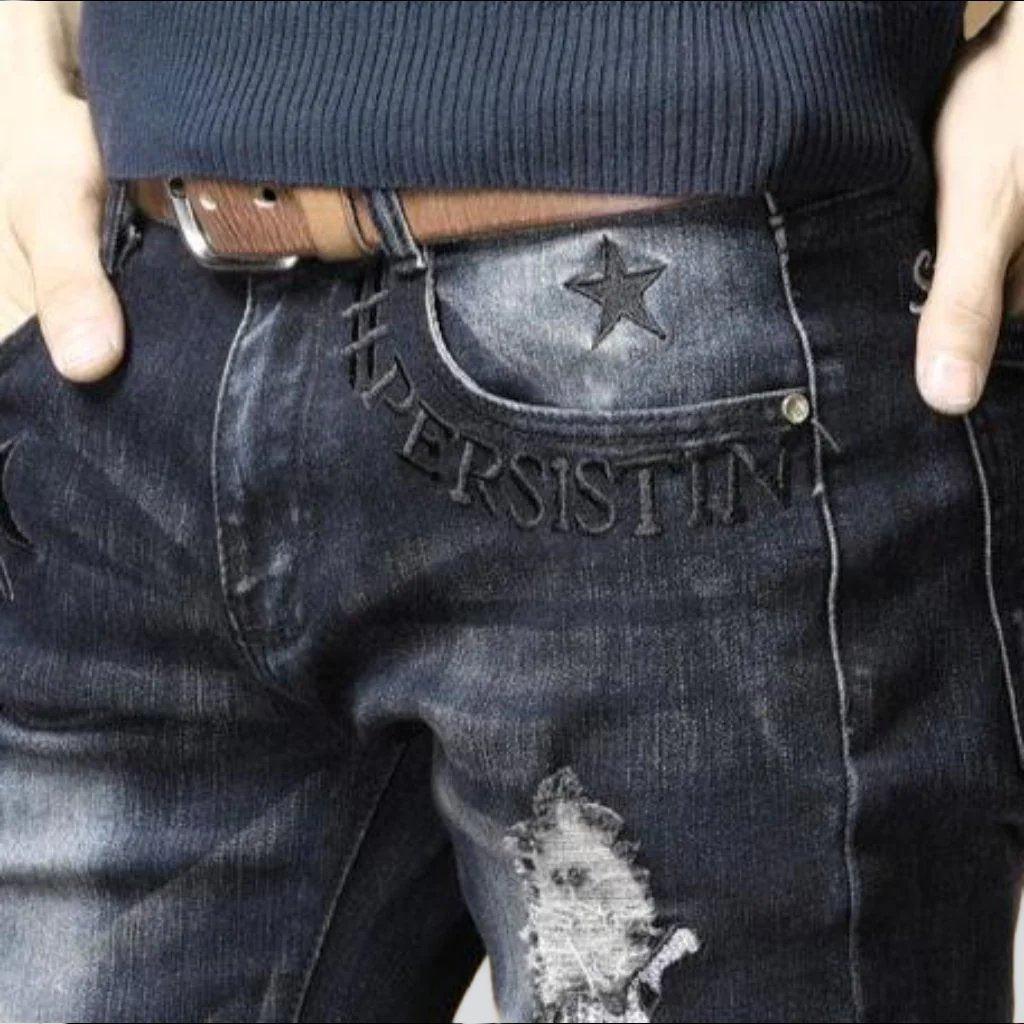 Sanded embroidered jeans for men