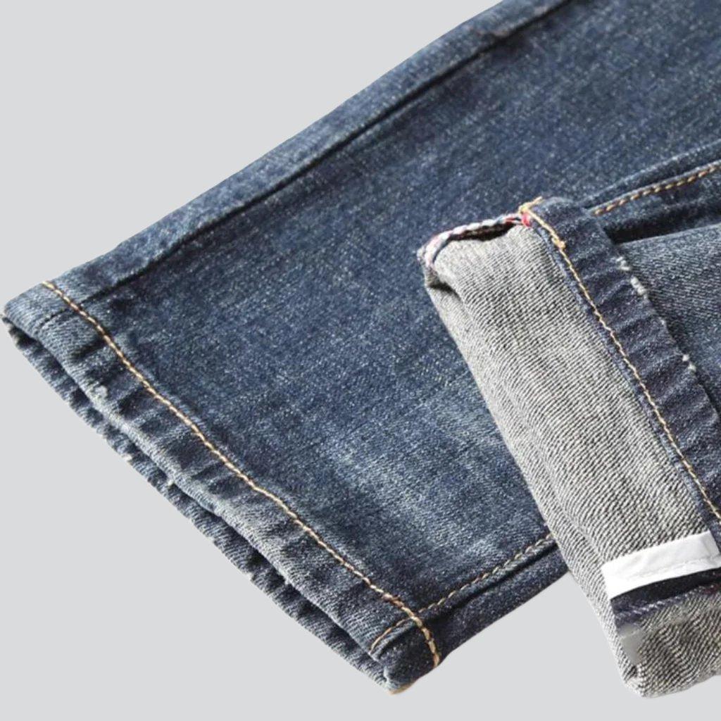 Vintage-Jeans für Herren mit bedruckten Taschen