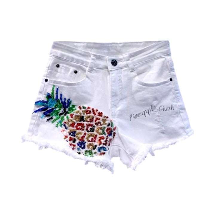 Shorts vaqueros desgastados con piña de cristal