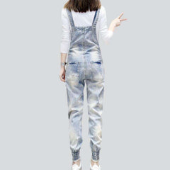 Graffiti face print denim jumpsuit