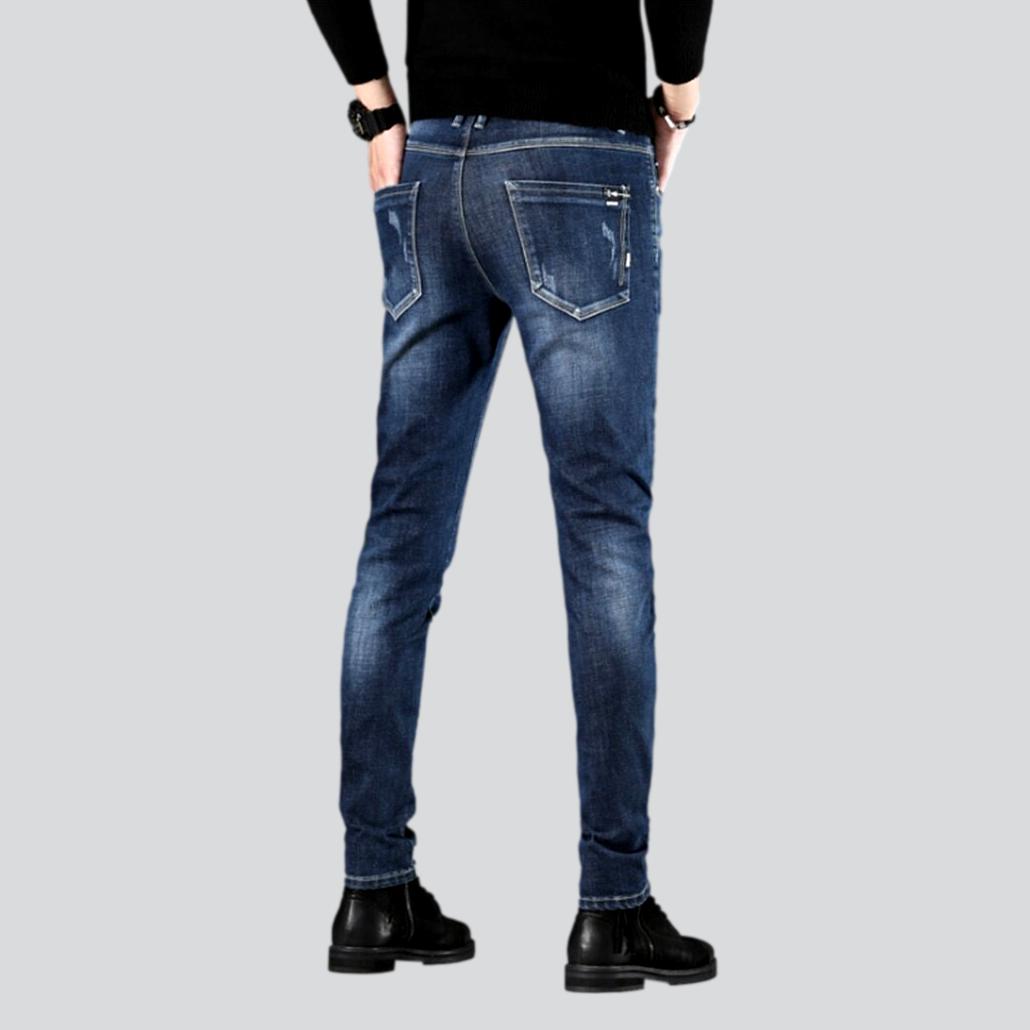 Slightly torn casual men jeans