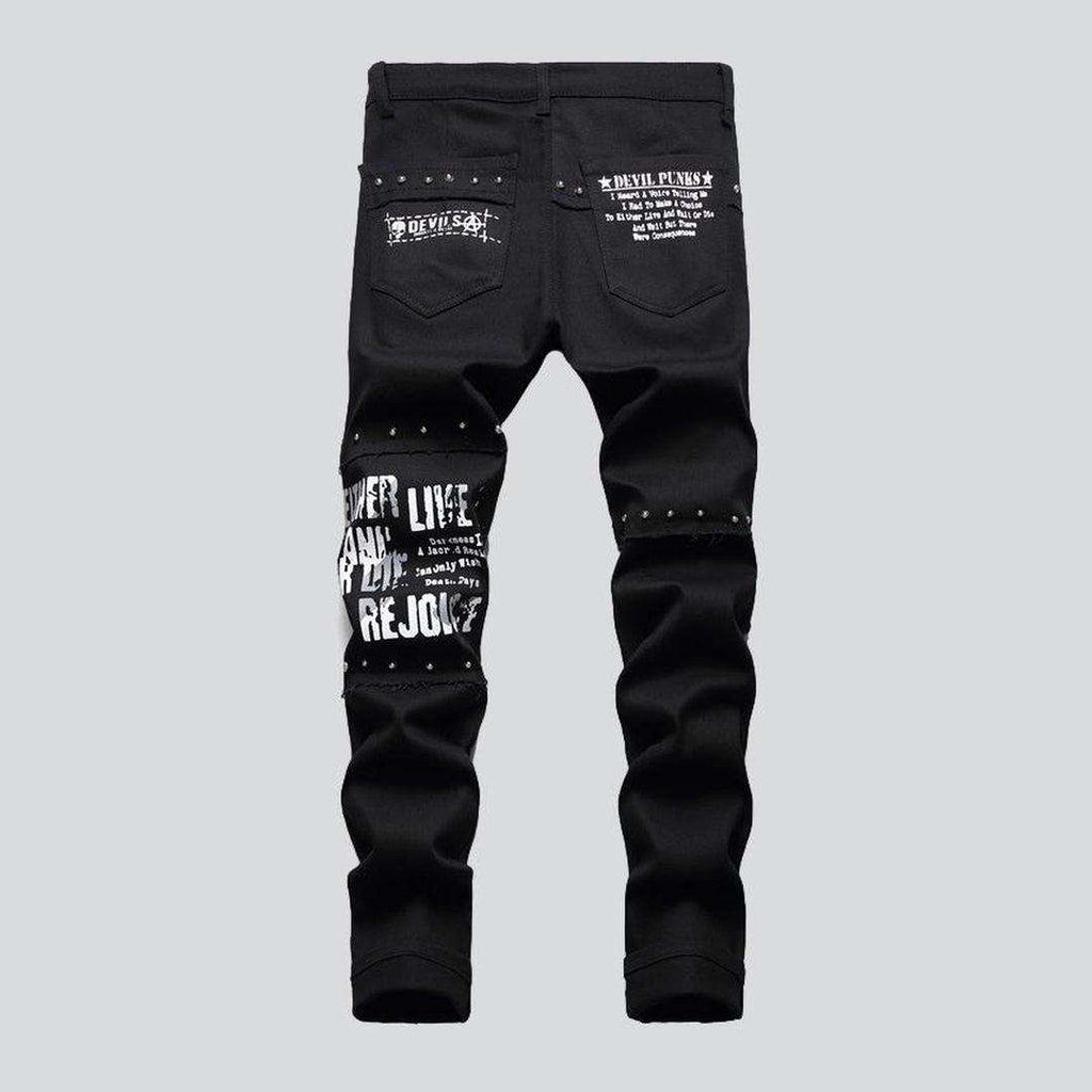 Schwarze Jeans mit karierten Patches