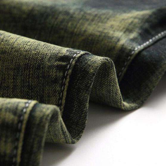 Green over-dyed distressed jeans